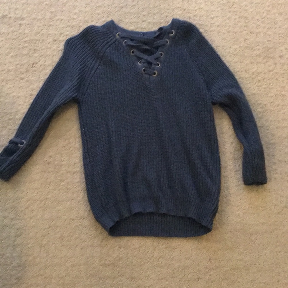 A lace up sweater